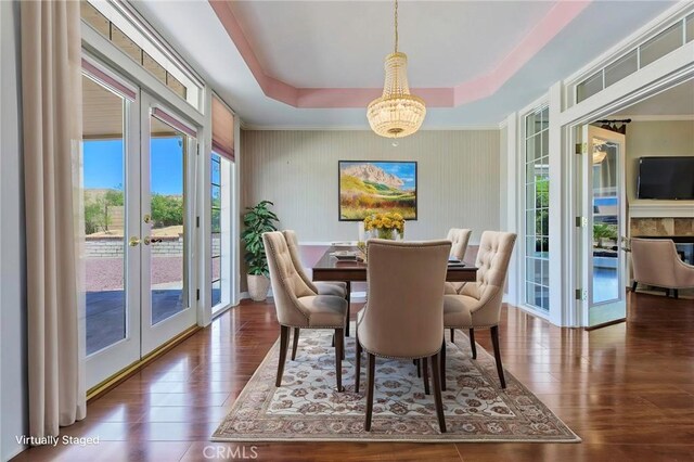 16350 Ridge View Dr, Apple Valley, CA 92307 - dining room with french doors, wood finished floors, a chandelier, and a tray ceiling