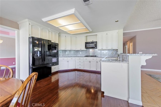 16350 Ridge View Dr, Apple Valley, CA 92307 - kitchen with black appliances, a peninsula, a sink, and tasteful backsplash