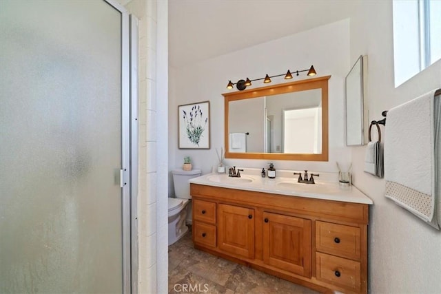 4180 Mount Baldy Ct, Norco, CA 92860 - bathroom with a stall shower, double vanity, and toilet