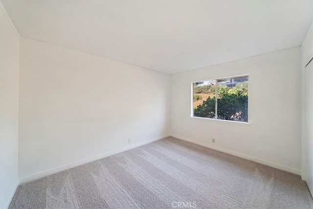 4180 Mount Baldy Ct, Norco, CA 92860 - unfurnished room featuring carpet flooring and baseboards