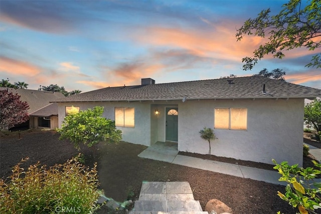 4180 Mount Baldy Ct, Norco, CA 92860 - view of front of home with stucco siding and a shingled roof