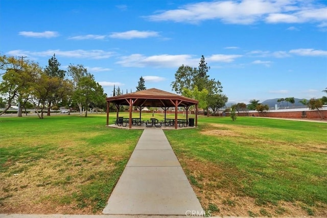 view of community with a gazebo and a lawn