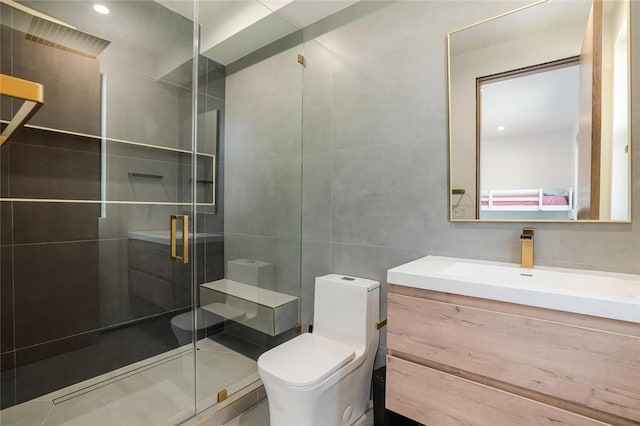 5141 Varna Ave, Sherman Oaks, CA 91423 - full bath with tile walls, toilet, a shower stall, vanity, and recessed lighting