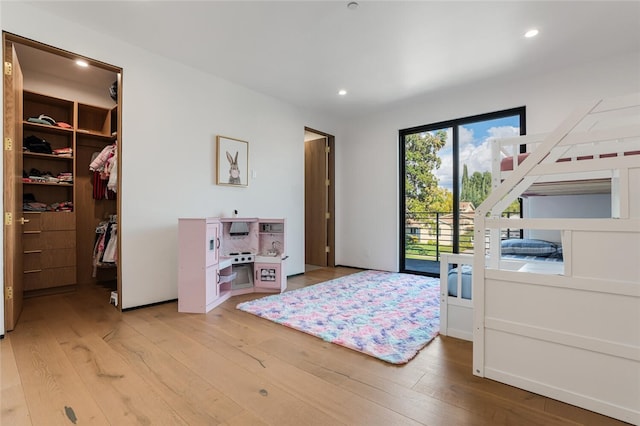 5141 Varna Ave, Sherman Oaks, CA 91423 - bedroom with light wood-style floors, a walk in closet, access to outside, recessed lighting, and a closet