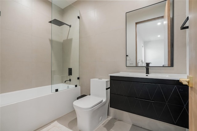 5141 Varna Ave, Sherman Oaks, CA 91423 - bathroom featuring tile walls, toilet, vanity, and bathing tub / shower combination