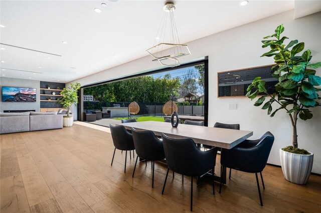 5141 Varna Ave, Sherman Oaks, CA 91423 - dining space featuring a chandelier, hardwood / wood-style floors, and recessed lighting