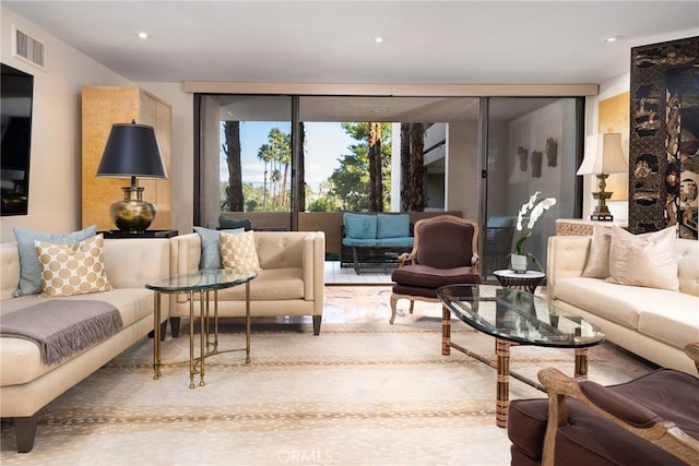 living room with floor to ceiling windows