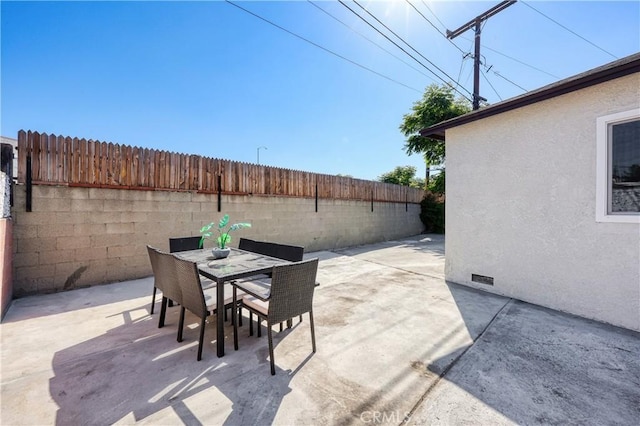 10641 Lindale St, Norwalk, CA 90650 - view of patio featuring fence and outdoor dining space