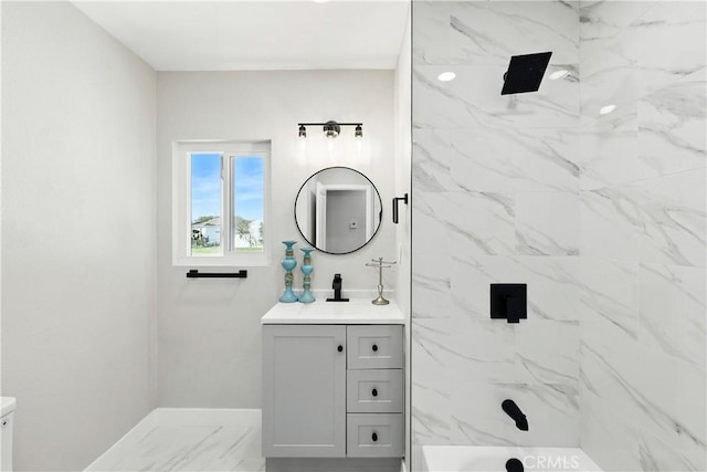 10641 Lindale St, Norwalk, CA 90650 - bathroom featuring marble look tile flooring, baseboards, vanity, and toilet