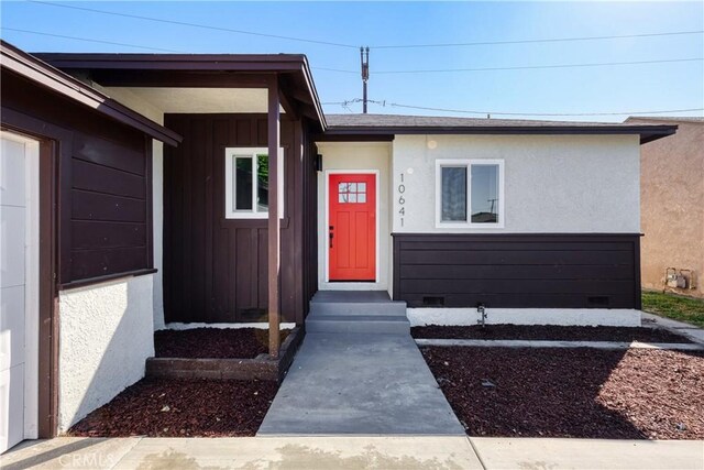 10641 Lindale St, Norwalk, CA 90650 - view of front of home with stucco siding and board and batten siding
