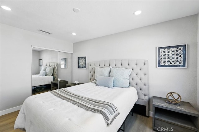 10641 Lindale St, Norwalk, CA 90650 - bedroom featuring wood finished floors, a closet, recessed lighting, and baseboards