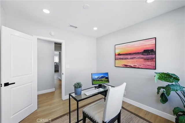 10641 Lindale St, Norwalk, CA 90650 - office area with light wood finished floors, baseboards, and recessed lighting