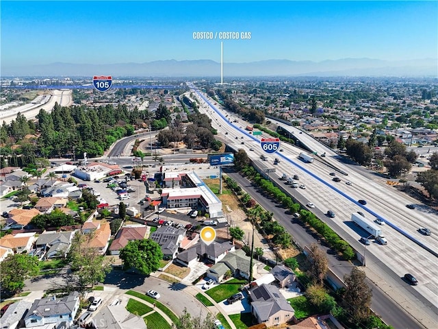 10641 Lindale St, Norwalk, CA 90650 - drone / aerial view of a main thoroughfare and a mountain backdrop