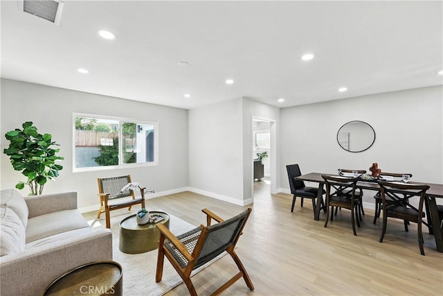 10641 Lindale St, Norwalk, CA 90650 - living area featuring recessed lighting, light wood-style floors, and baseboards