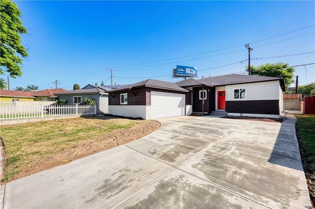 10641 Lindale St, Norwalk, CA 90650 - ranch-style house with an attached garage, stucco siding, and concrete driveway