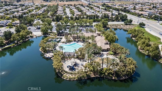 bird's eye view of a pool and a large body of water