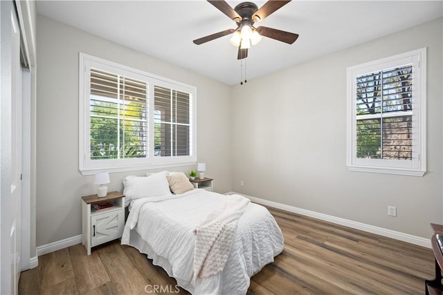 28264 Spring Creek Way, Menifee, CA 92585 - bedroom with wood finished floors, baseboards, and ceiling fan