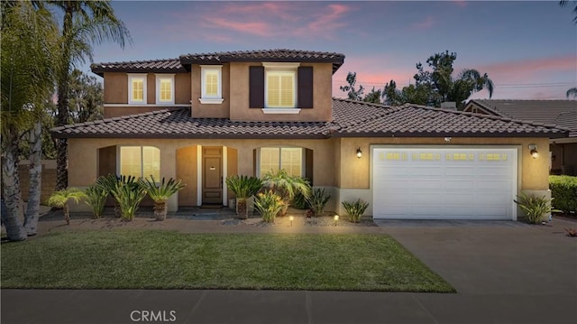 28264 Spring Creek Way, Menifee, CA 92585 - mediterranean / spanish-style home featuring a tile roof, concrete driveway, stucco siding, and an attached garage