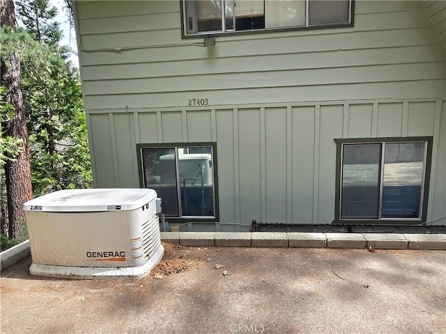 27403 Cottonwood Ln, Lake Arrowhead, CA 92317 - exterior view of a power unit and board and batten siding