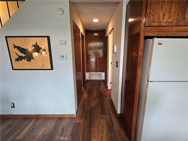 27403 Cottonwood Ln, Lake Arrowhead, CA 92317 - hallway featuring dark wood-style floors and baseboards