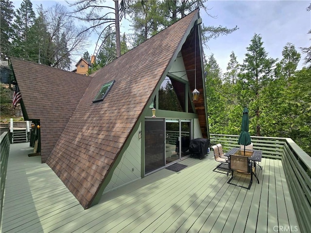 27403 Cottonwood Ln, Lake Arrowhead, CA 92317 - wooden deck featuring outdoor dining area and area for grilling
