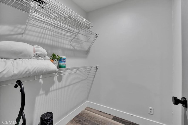 2612 Chauncy Pl, Riverside, CA 92506 - walk in closet featuring wood finished floors