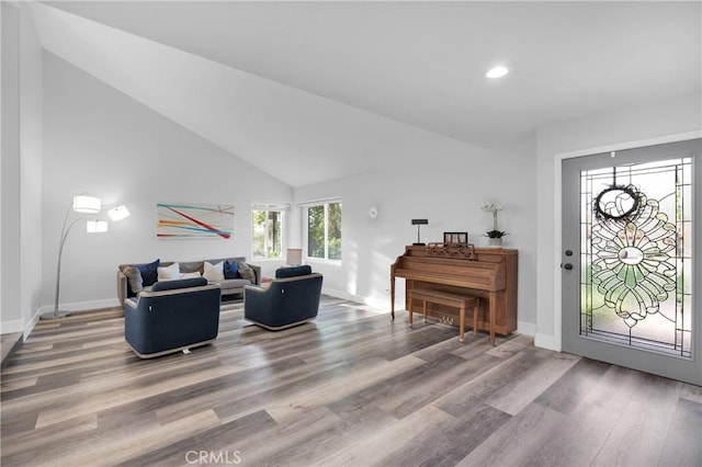 2612 Chauncy Pl, Riverside, CA 92506 - living room featuring wood finished floors, baseboards, recessed lighting, and vaulted ceiling