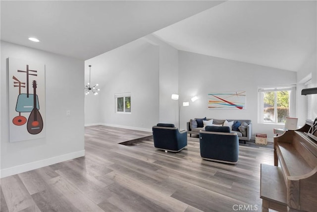 2612 Chauncy Pl, Riverside, CA 92506 - living room with lofted ceiling, wood finished floors, a chandelier, recessed lighting, and baseboards