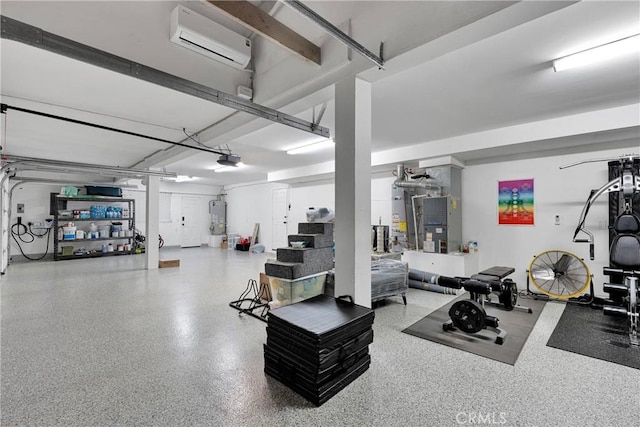 2612 Chauncy Pl, Riverside, CA 92506 - exercise room with a garage, a wall unit AC, and water heater