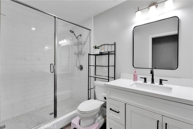 2612 Chauncy Pl, Riverside, CA 92506 - bathroom featuring toilet, a shower stall, and vanity