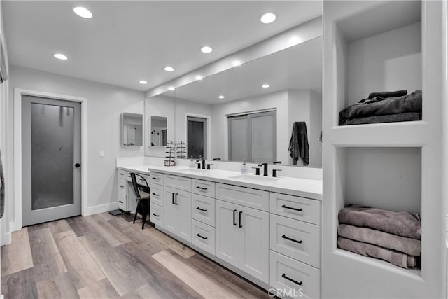 2612 Chauncy Pl, Riverside, CA 92506 - bathroom with vanity, recessed lighting, wood finished floors, and baseboards