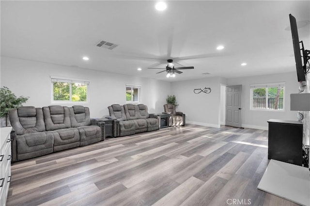 2612 Chauncy Pl, Riverside, CA 92506 - living area featuring recessed lighting, healthy amount of natural light, ceiling fan, light wood-style floors, and baseboards