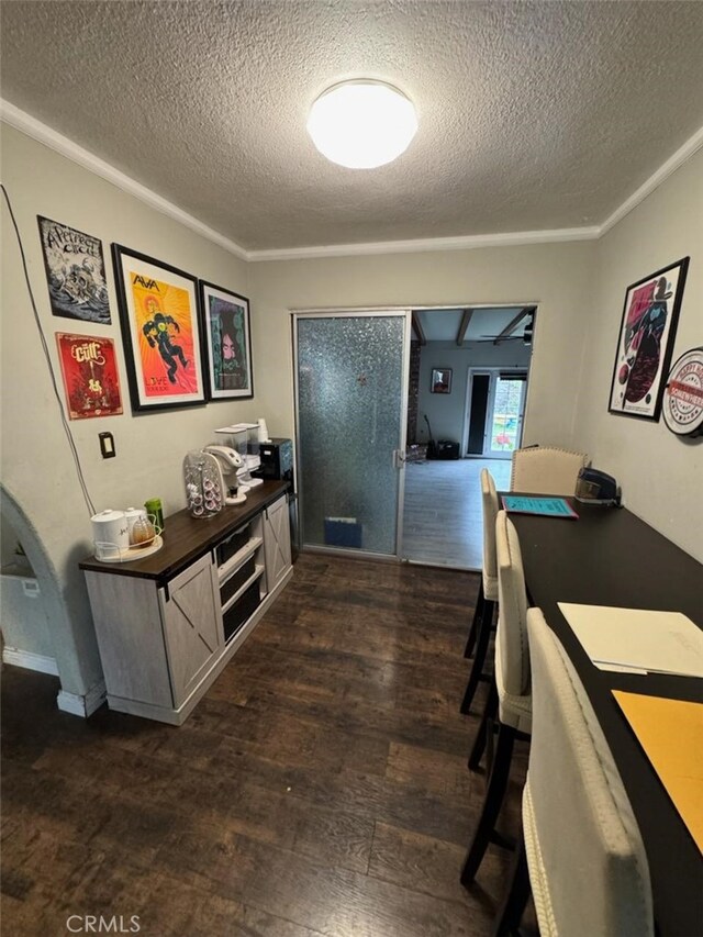 6045 Harding Ave, South Gate, CA 90280 - office featuring dark wood finished floors, a textured ceiling, and ornamental molding