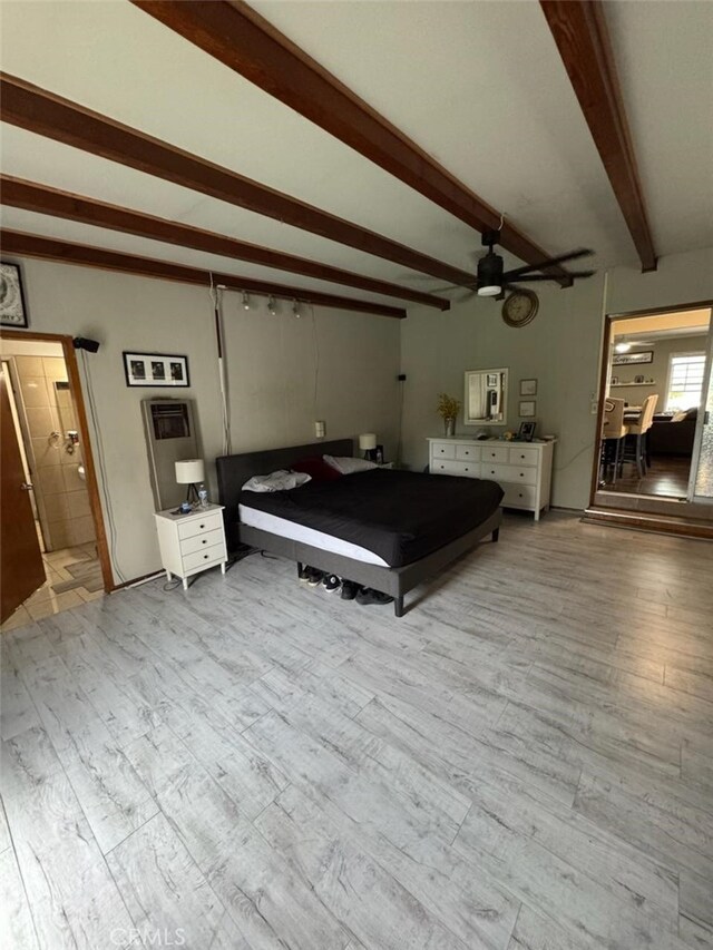 6045 Harding Ave, South Gate, CA 90280 - bedroom with beam ceiling, wood finished floors, billiards, and ceiling fan