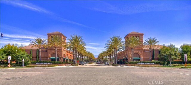 21 Fanpalm, Irvine, CA 92620 - view of asphalt road featuring sidewalks, curbs, and traffic signs