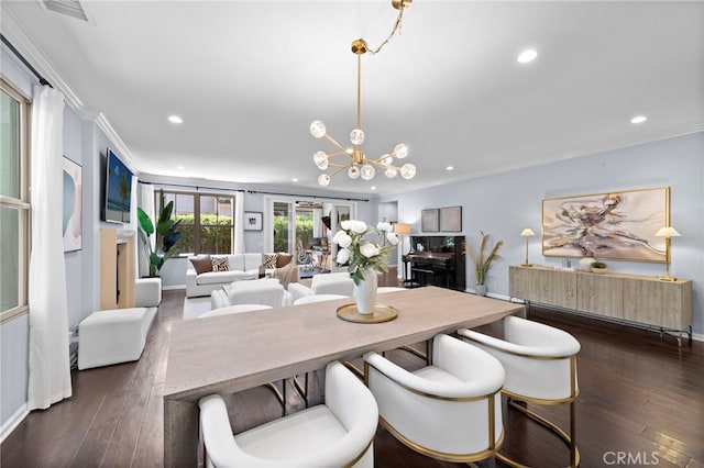 21 Fanpalm, Irvine, CA 92620 - dining area featuring recessed lighting, ornamental molding, dark wood-style flooring, a chandelier, and baseboards