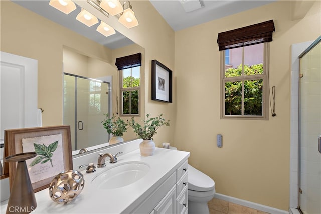 21 Fanpalm, Irvine, CA 92620 - bathroom with a stall shower, tile patterned flooring, toilet, vanity, and baseboards