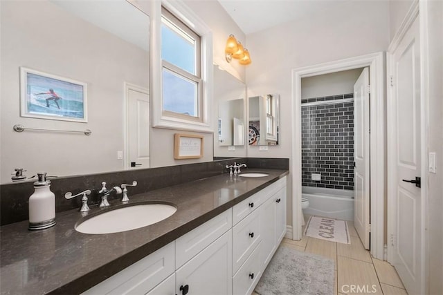31740 Via Pamplona, San Juan Capistrano, CA 92675 - full bath featuring double vanity, toilet, tile patterned floors, and shower / washtub combination
