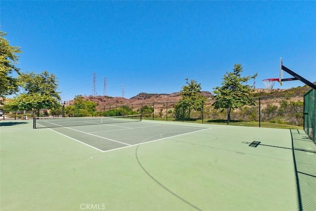 31740 Via Pamplona, San Juan Capistrano, CA 92675 - view of tennis court with community basketball court and fence