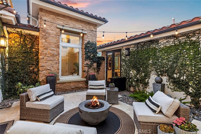 31740 Via Pamplona, San Juan Capistrano, CA 92675 - patio terrace at dusk featuring a fire pit