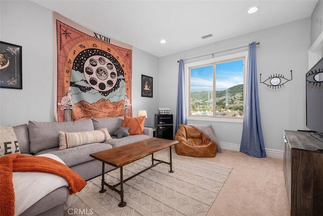 31740 Via Pamplona, San Juan Capistrano, CA 92675 - living room featuring light carpet, baseboards, and recessed lighting