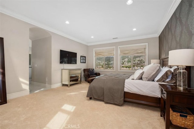 31740 Via Pamplona, San Juan Capistrano, CA 92675 - bedroom with baseboards, recessed lighting, light colored carpet, crown molding, and arched walkways