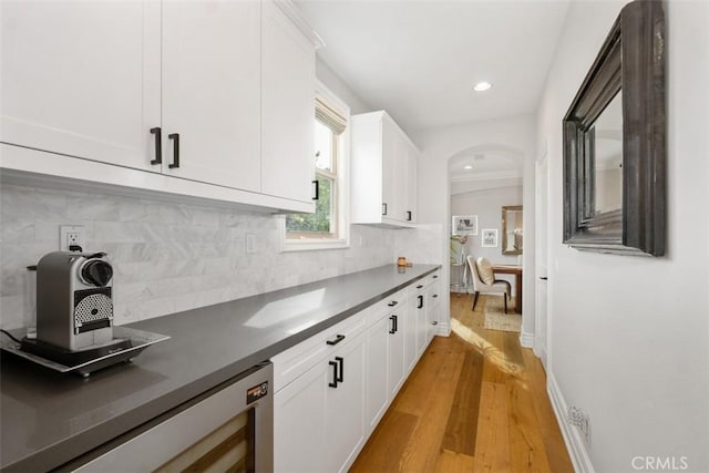 31740 Via Pamplona, San Juan Capistrano, CA 92675 - kitchen with light wood finished floors, white cabinetry, dark countertops, and recessed lighting