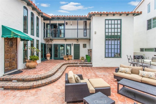 1585 E Ocean Blvd, Newport Beach, CA 92661 - patio / terrace featuring a patio area, an outdoor hangout area, and french doors