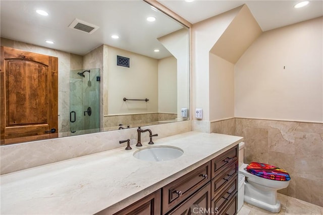 1585 E Ocean Blvd, Newport Beach, CA 92661 - bathroom with tile walls, vanity, a shower stall, wainscoting, and recessed lighting