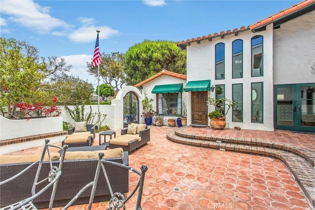 1585 E Ocean Blvd, Newport Beach, CA 92661 - view of patio featuring french doors and an outdoor hangout area