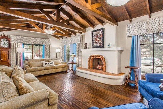 1585 E Ocean Blvd, Newport Beach, CA 92661 - living room featuring hardwood / wood-style floors, wood ceiling, and a warm lit fireplace