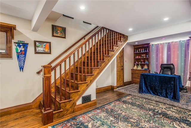 1585 E Ocean Blvd, Newport Beach, CA 92661 - stairway with wood finished floors and recessed lighting