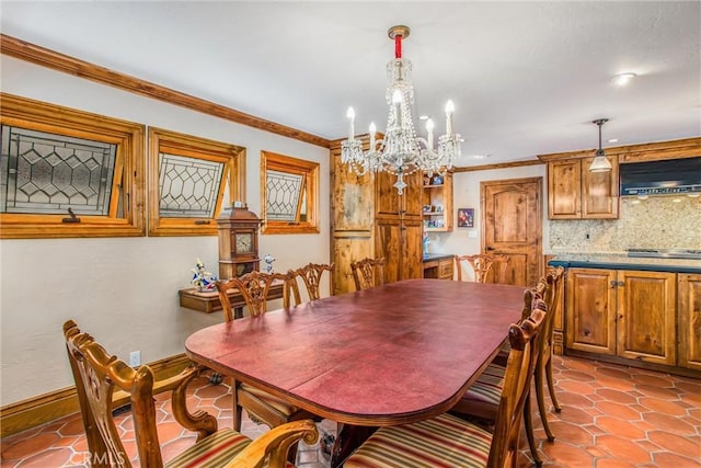1585 E Ocean Blvd, Newport Beach, CA 92661 - dining space featuring a chandelier and crown molding