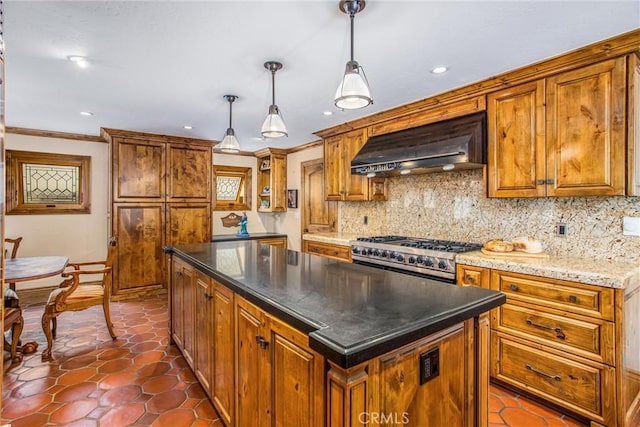 1585 E Ocean Blvd, Newport Beach, CA 92661 - kitchen with wall chimney range hood, stove, decorative backsplash, a center island, and ornamental molding